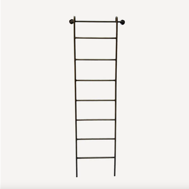 Black metal ladder on a white background