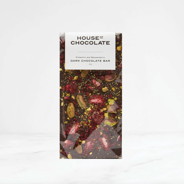 Dark chocolate bar with visible nuts and berries packaging on a white background
