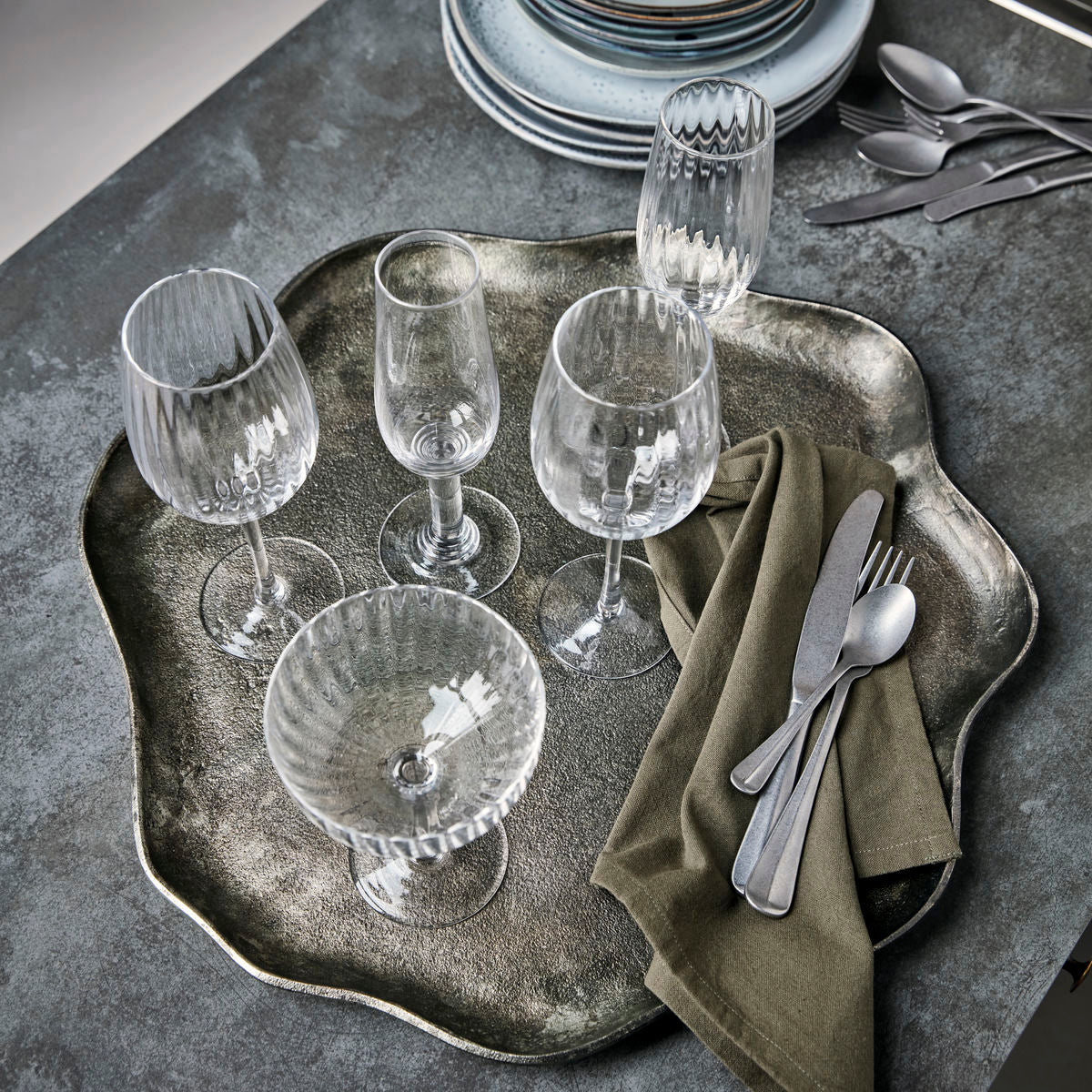 Wavy edged metal tray in antique silver colour 